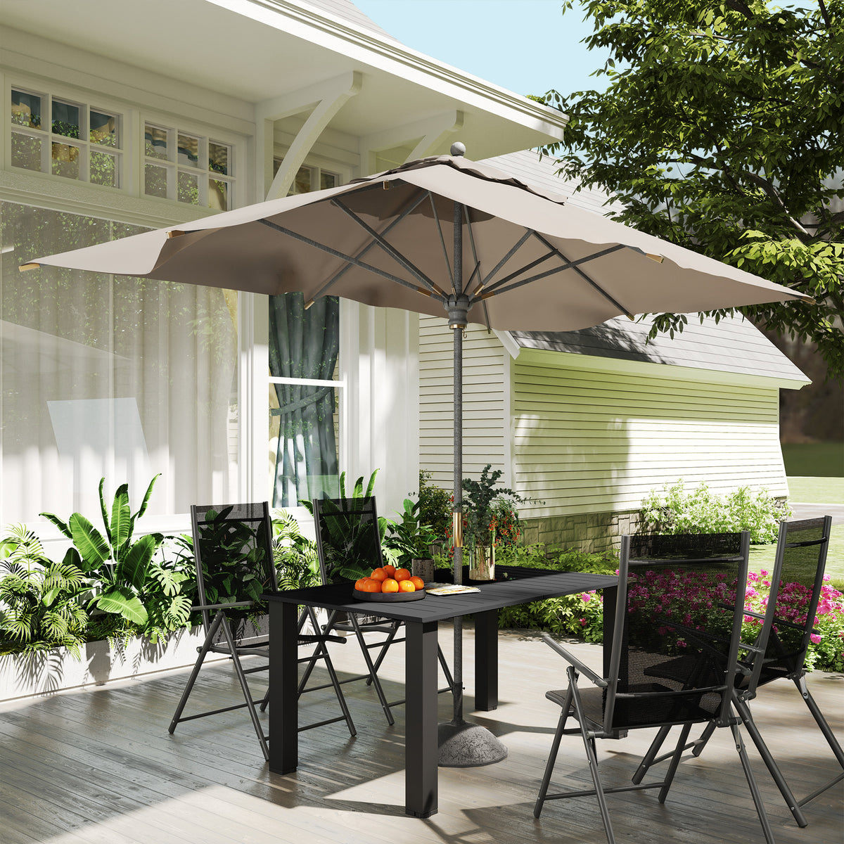 Black rectangular outdoor dining table beneath a patio umbrella