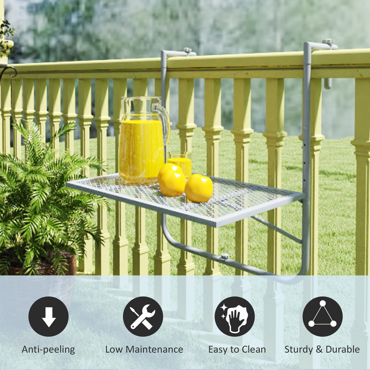 Grey metal balcony table mounted on a railing, with a pitcher and fruit on its grid top