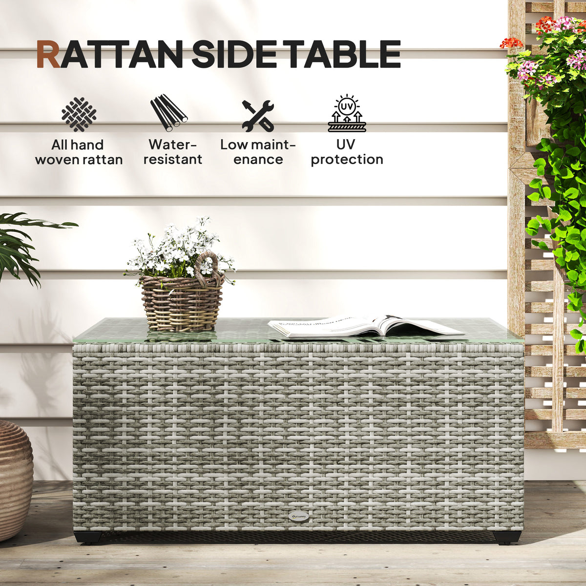 Light grey woven rattan side table with a glass top, shown from the front