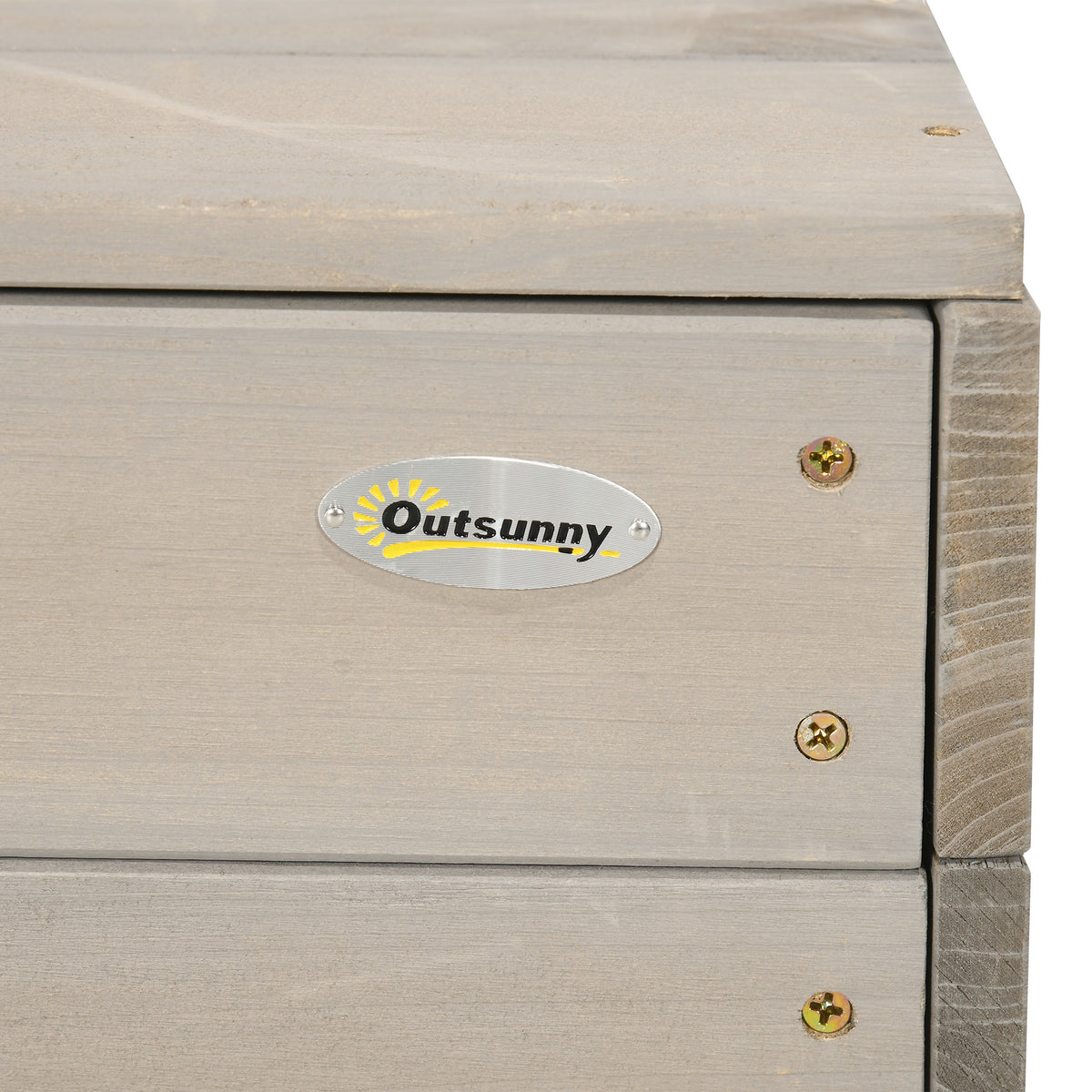 Close-up of grey wooden sandpit boards with Outsunny badge and screws