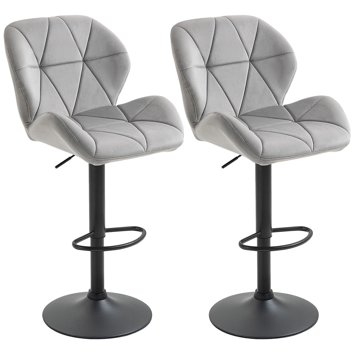 Pair of light gray velvet-touch bar stools with tufted seats, black footrests and round bases