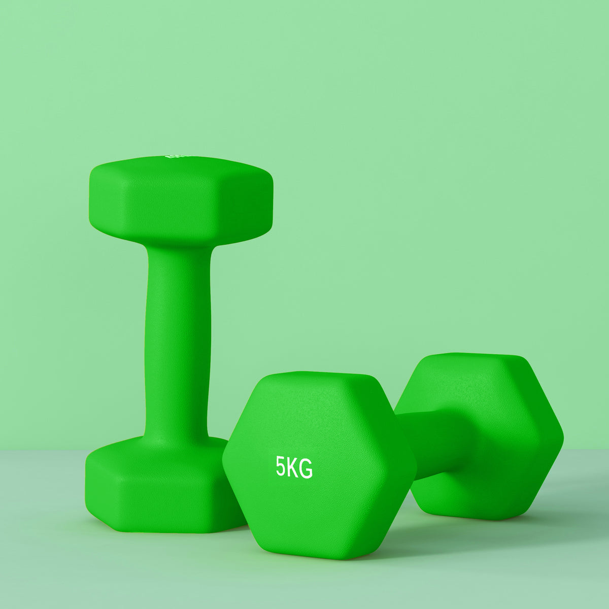 Green 5 kg hex dumbbells shown upright and at an angle