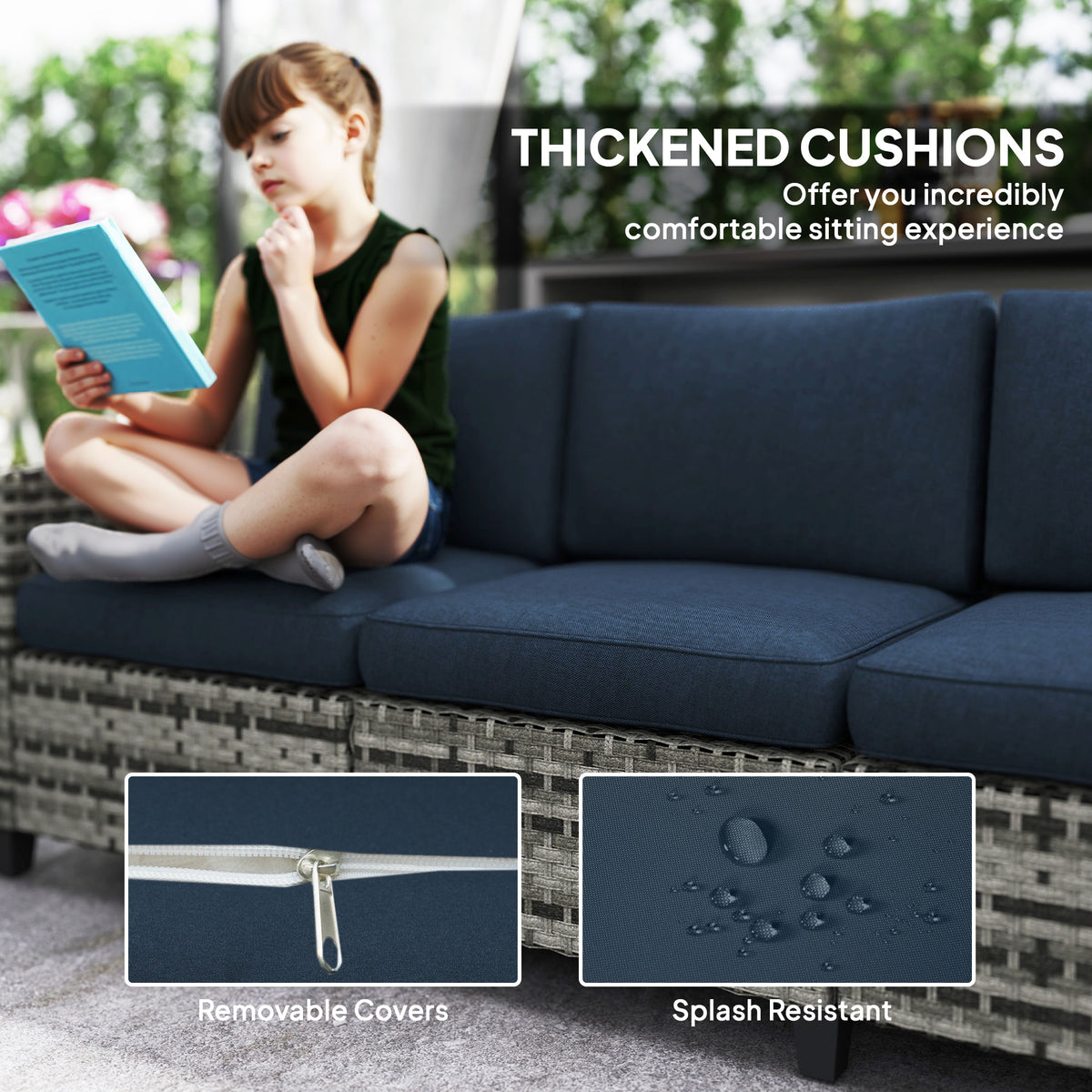 Rattan sofa with thick navy cushions and removable, splash-resistant covers