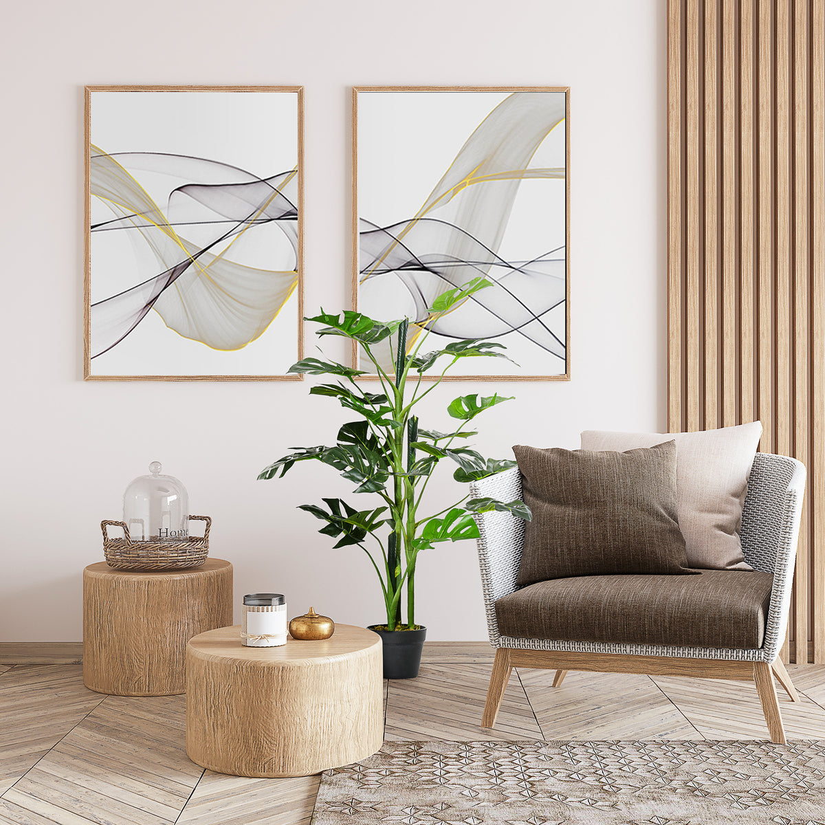 Artificial Monstera tree in a black pot beside a living room chair