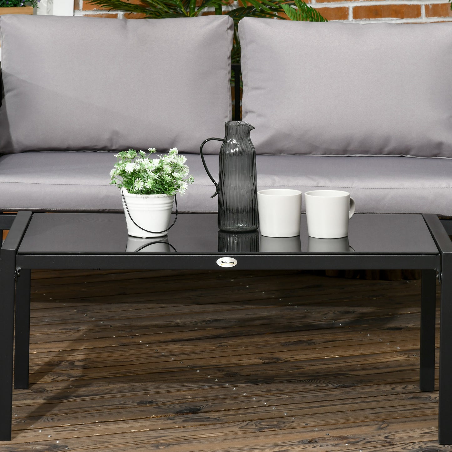 Outsunny 4 Piece Metal Garden Furniture Set with Tempered Glass Coffee Table, Texteline Pocket, Outdoor Set Loveseat Single Armchairs with Padded Cushions, Light Grey