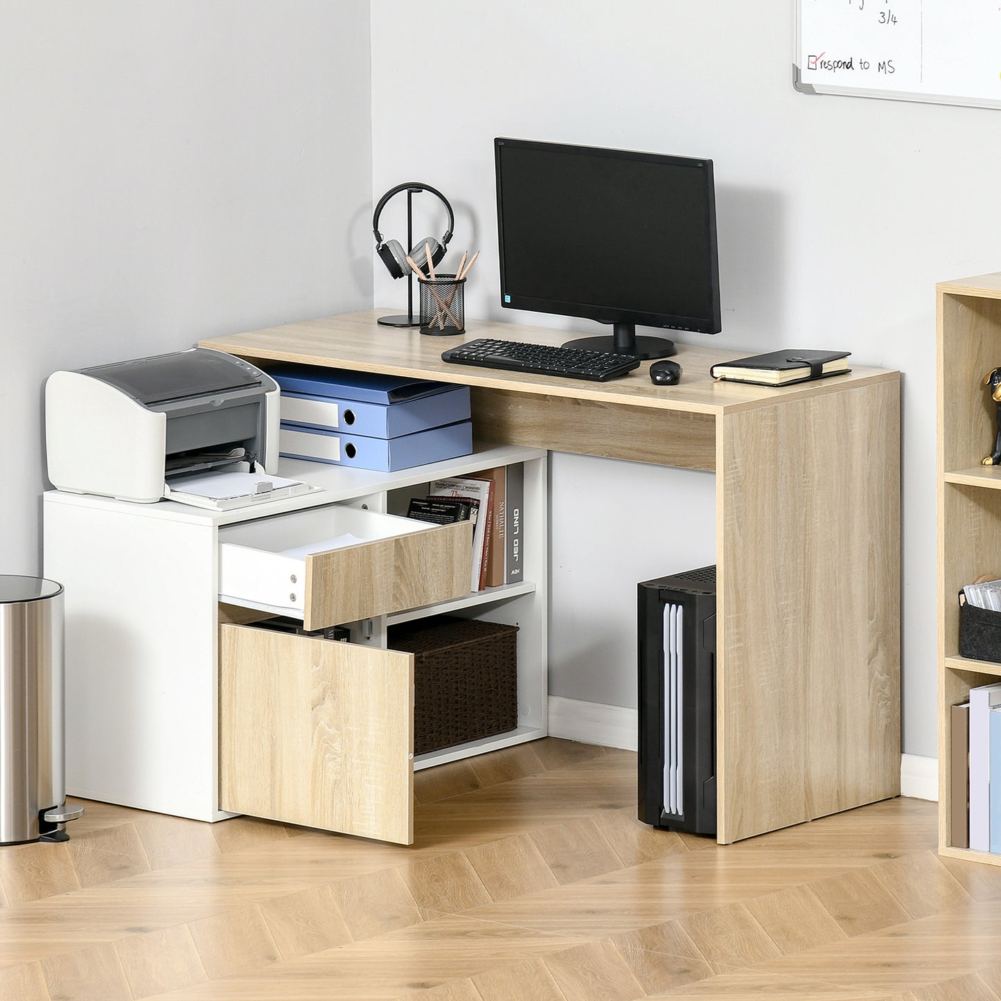 L-shaped desk with open drawer and cabinet door, shown in a home office