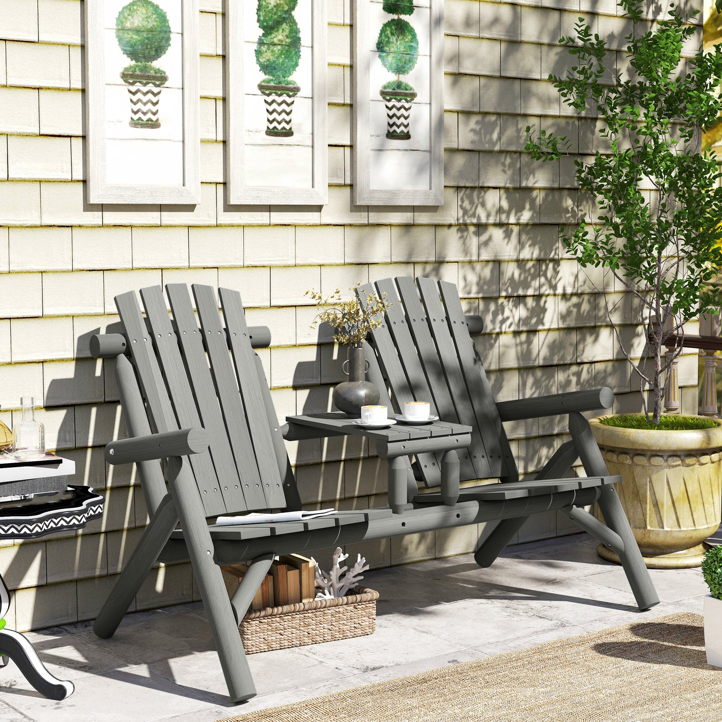 Grey wooden two-seat bench with centre table, shown in an outdoor setting