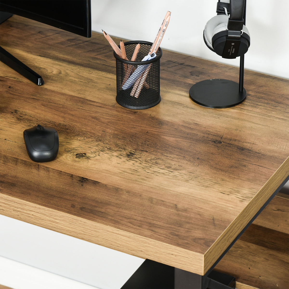 Desk with a close-up view of its brown wood-grain desktop