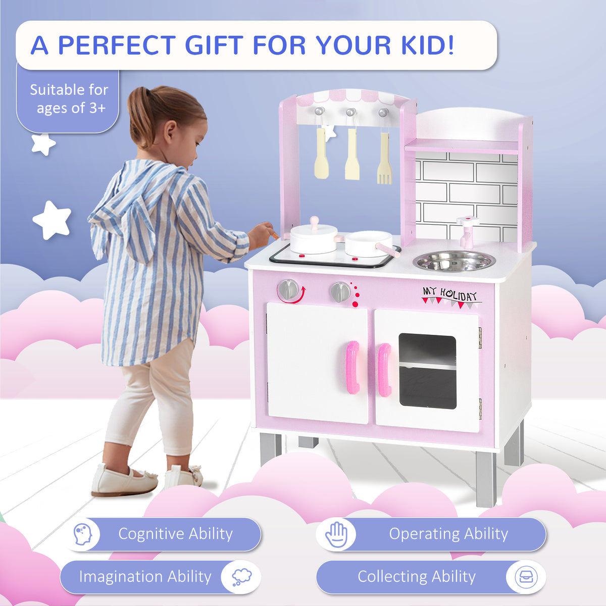 Pink toy kitchen playset with stove, sink, oven, and hanging utensils beside a child