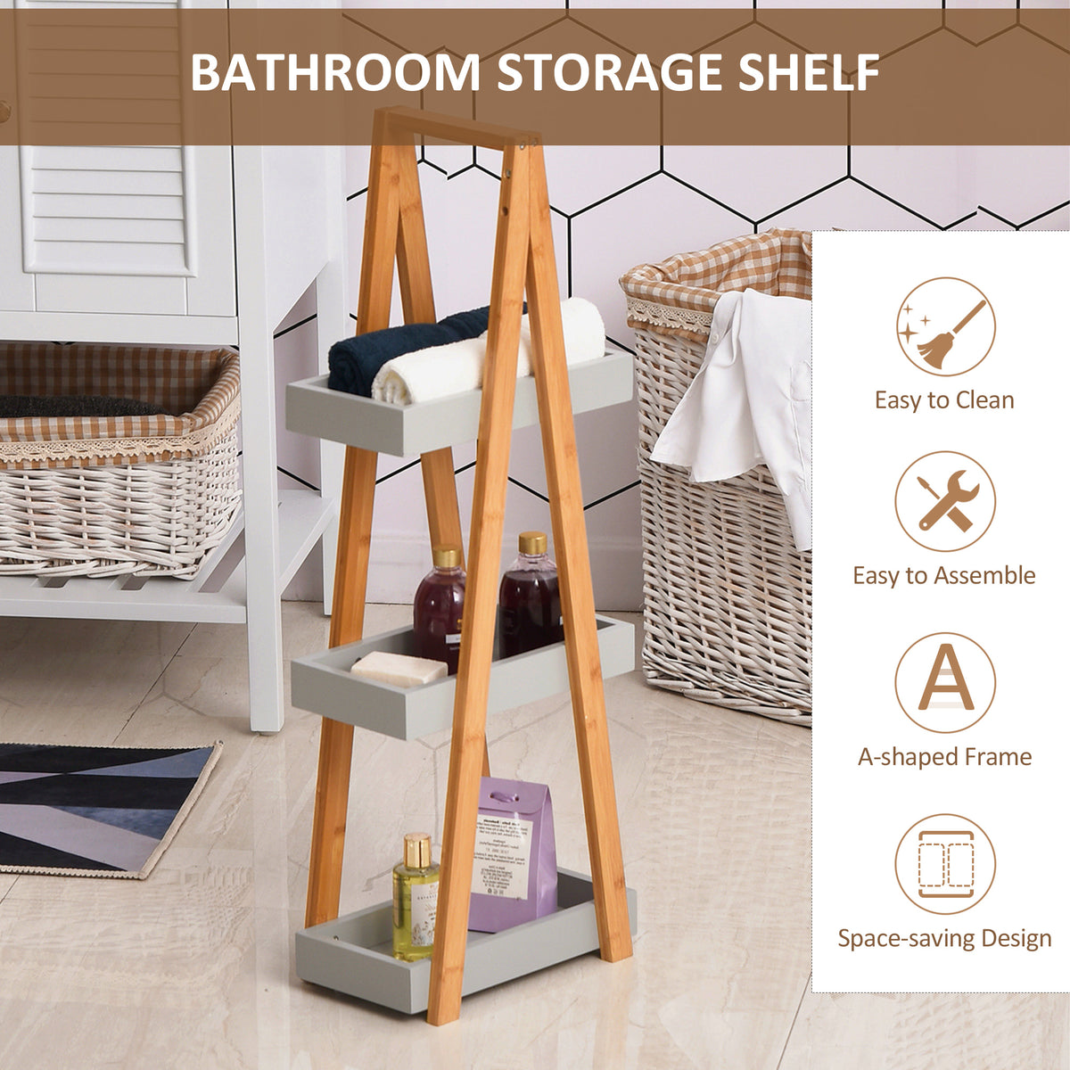 Three-tier bamboo bathroom shelf holding towels and toiletries