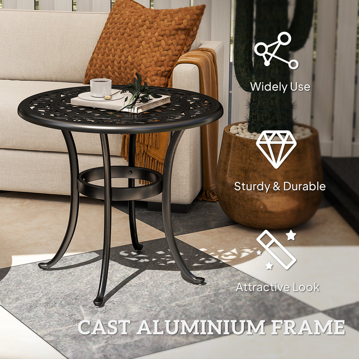 Black cast aluminum patio table with decorative round top and curved legs