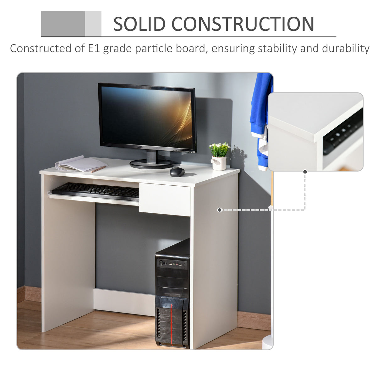 White desk with keyboard tray and close-up of particleboard edge