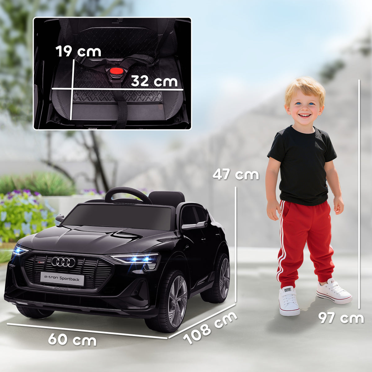 Black Audi e-tron kids' electric ride-on car with seat dimensions and overall size shown.