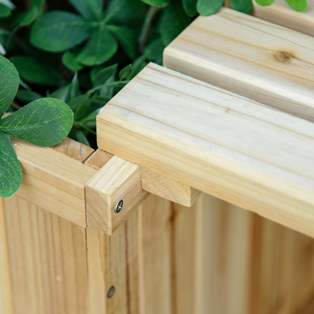 Outsunny wooden planter bench close-up of the slatted seat and corner joint