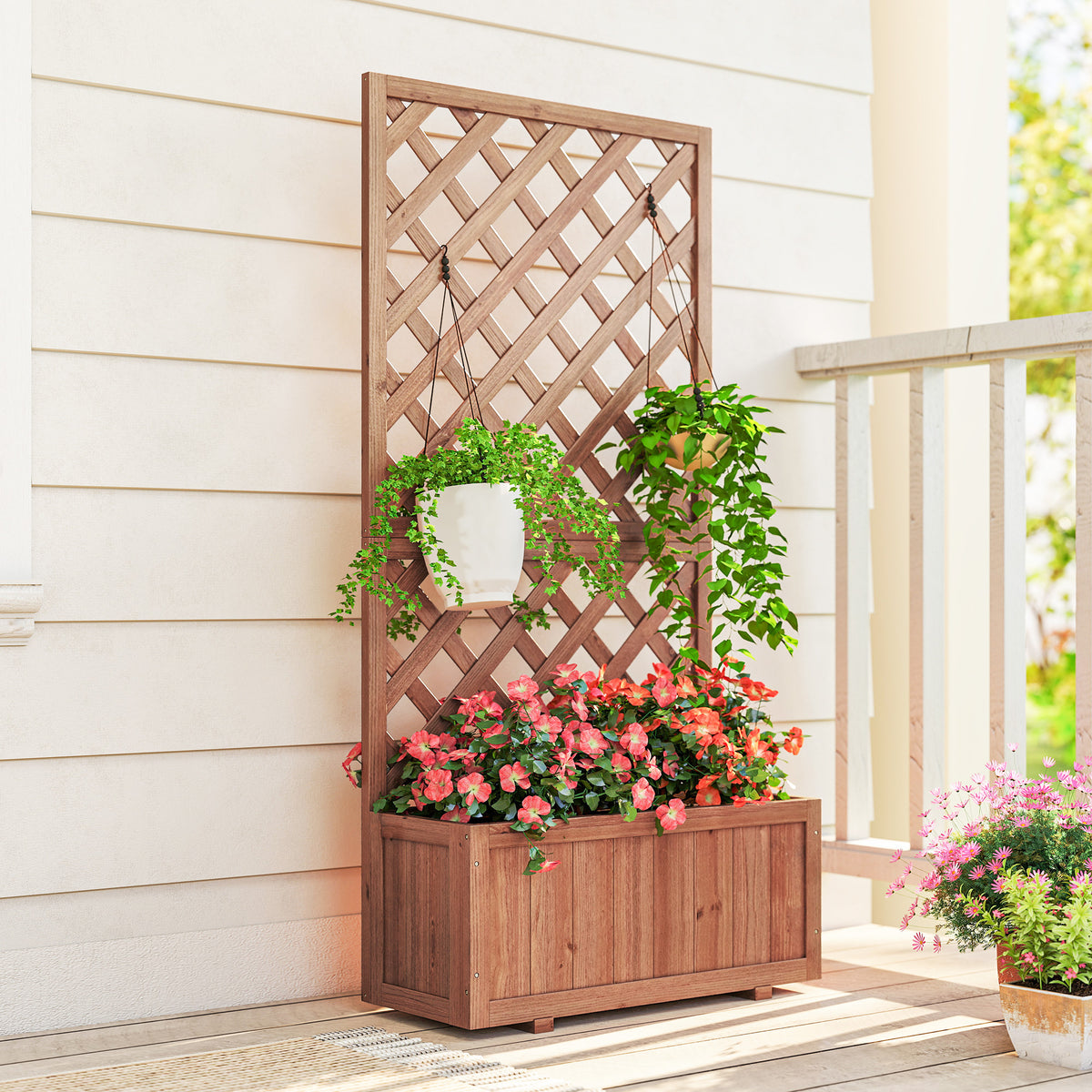 Wooden raised planter with diamond trellis, hanging pots, and red flowers