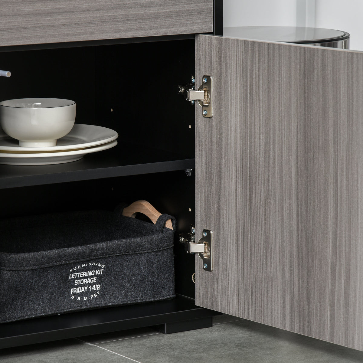 Open sideboard door reveals adjustable shelves, silver hinges, and interior storage.
