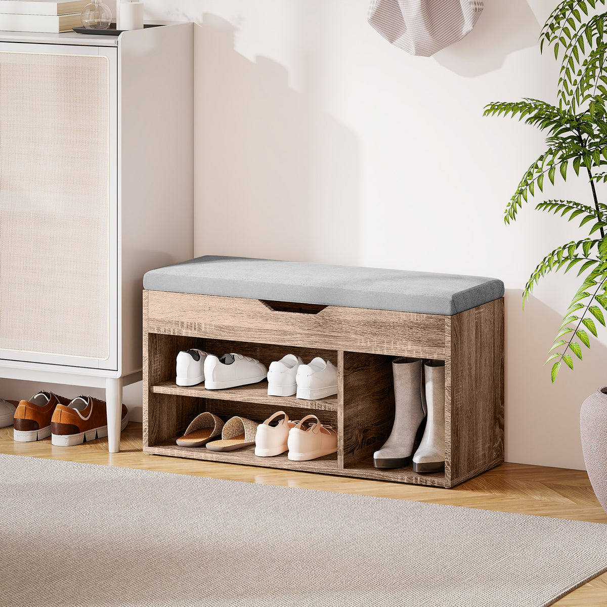 Wood-grain shoe bench with gray padded seat, open shoe shelves and tall side compartment