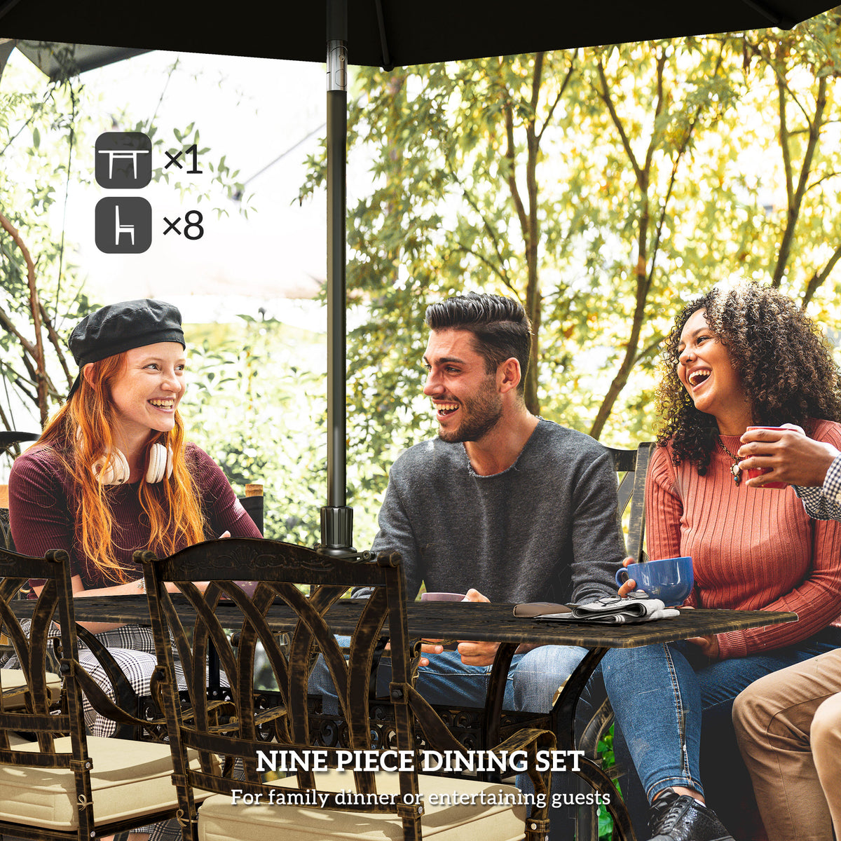 Nine-piece bronze-tone cast aluminium garden dining set with beige-cushioned chairs
