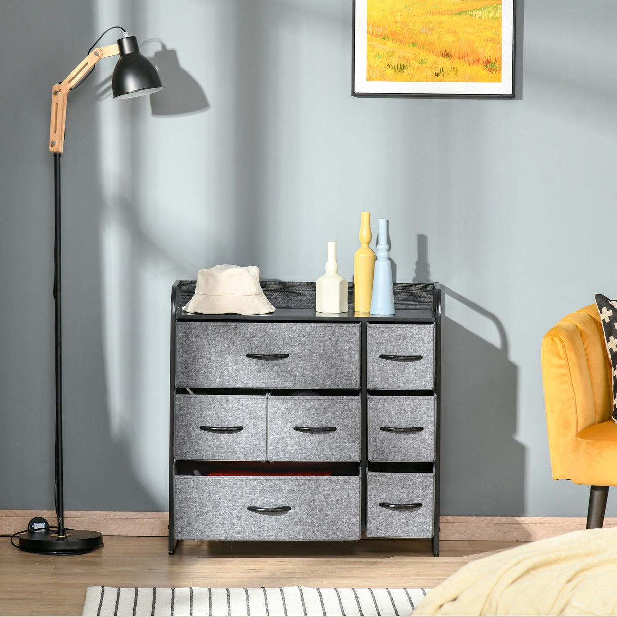 HOMCOM grey fabric dresser with seven drawers and a black metal frame