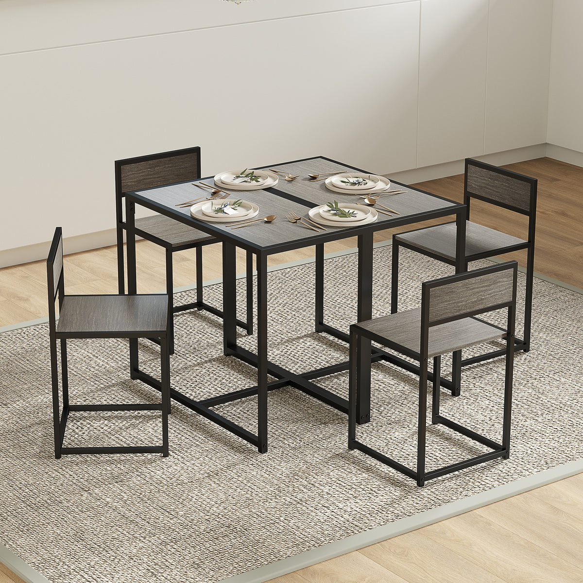 Gray wood-effect dining table with four matching black steel-frame chairs