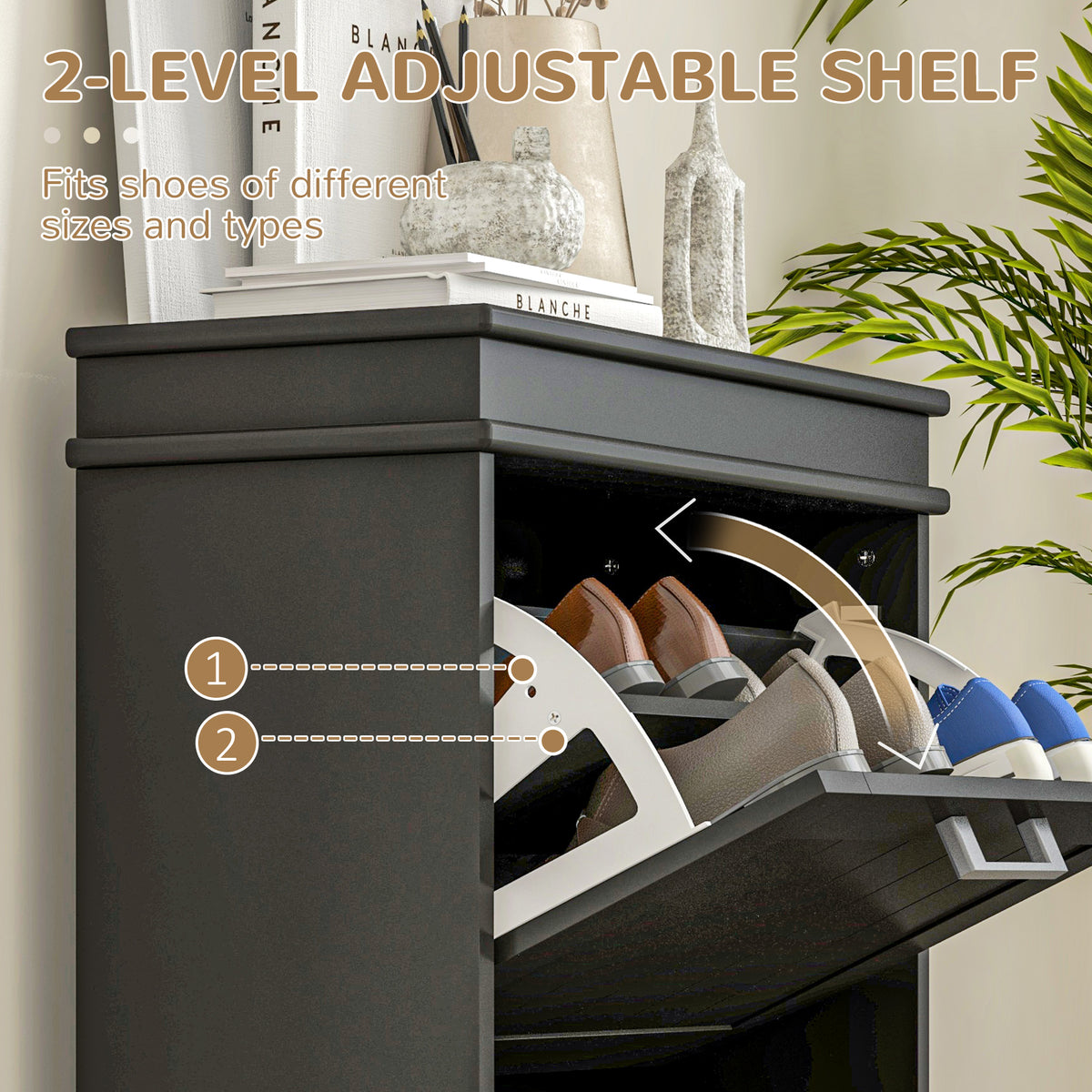 Close-up of the black shoe cabinet's open compartment and adjustable two-level shelf.