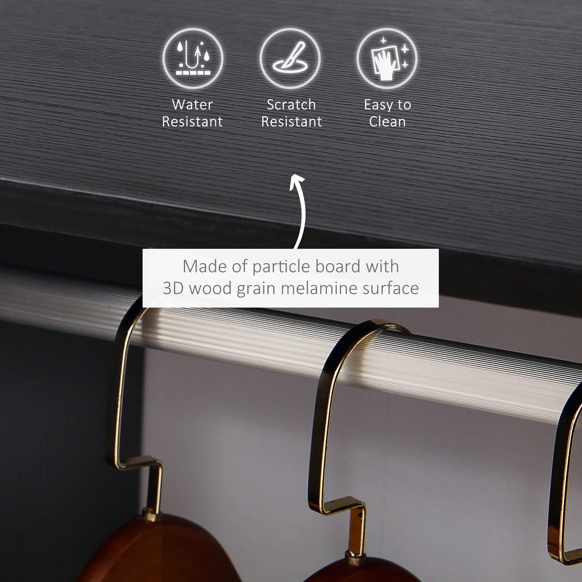 Close-up of the wardrobe's black wood-grain surface and metal clothes rail