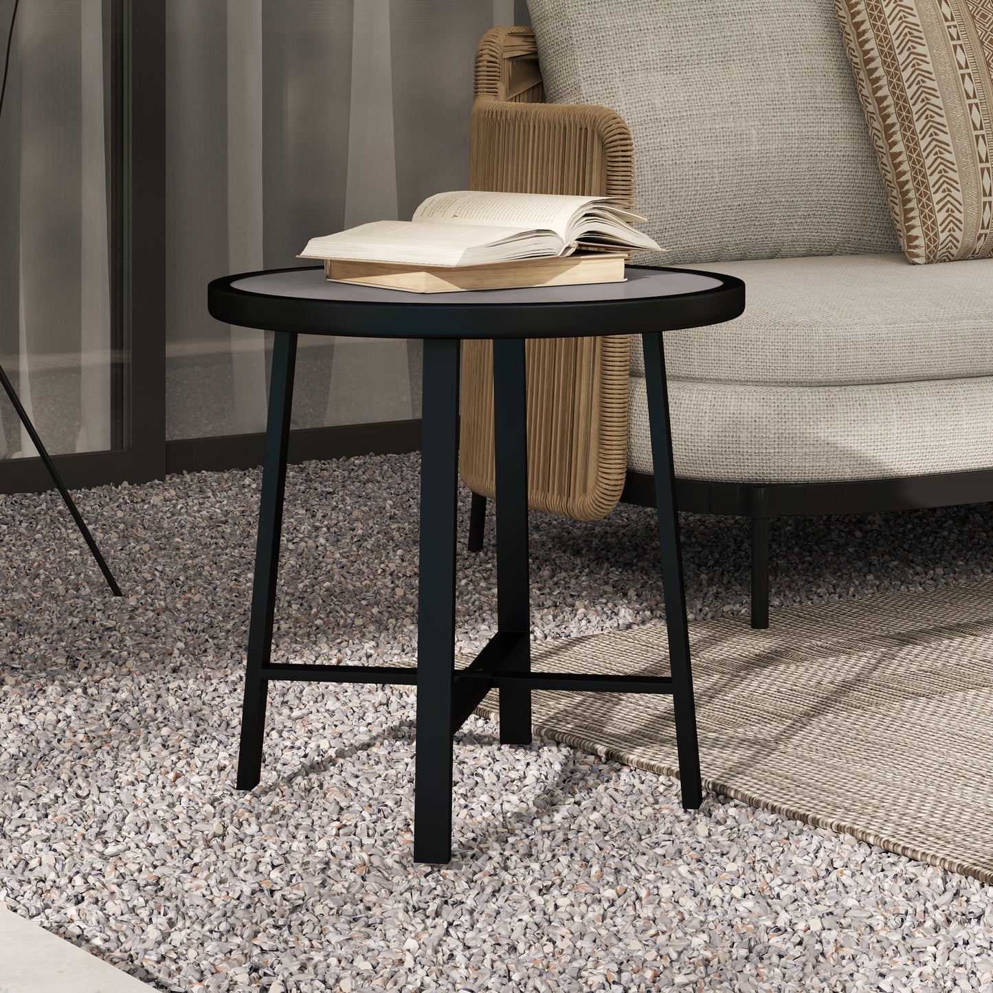 Outsunny round side table with a book on its gray wood-effect top