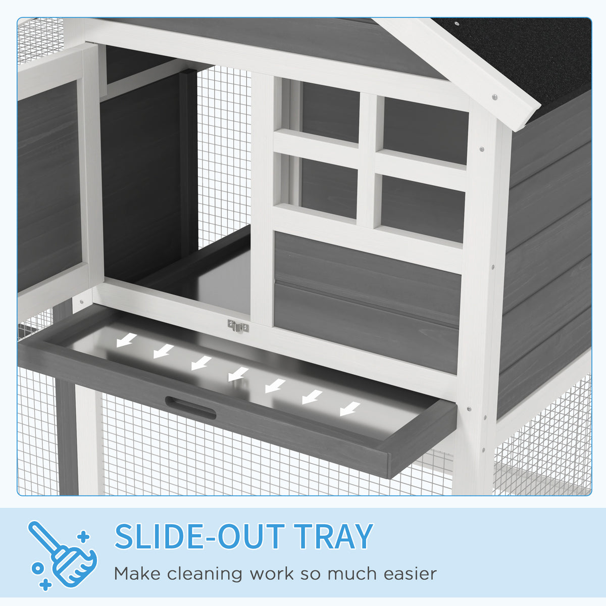 Close-up of the rabbit hutch's pull-out cleaning tray beneath the raised shelter