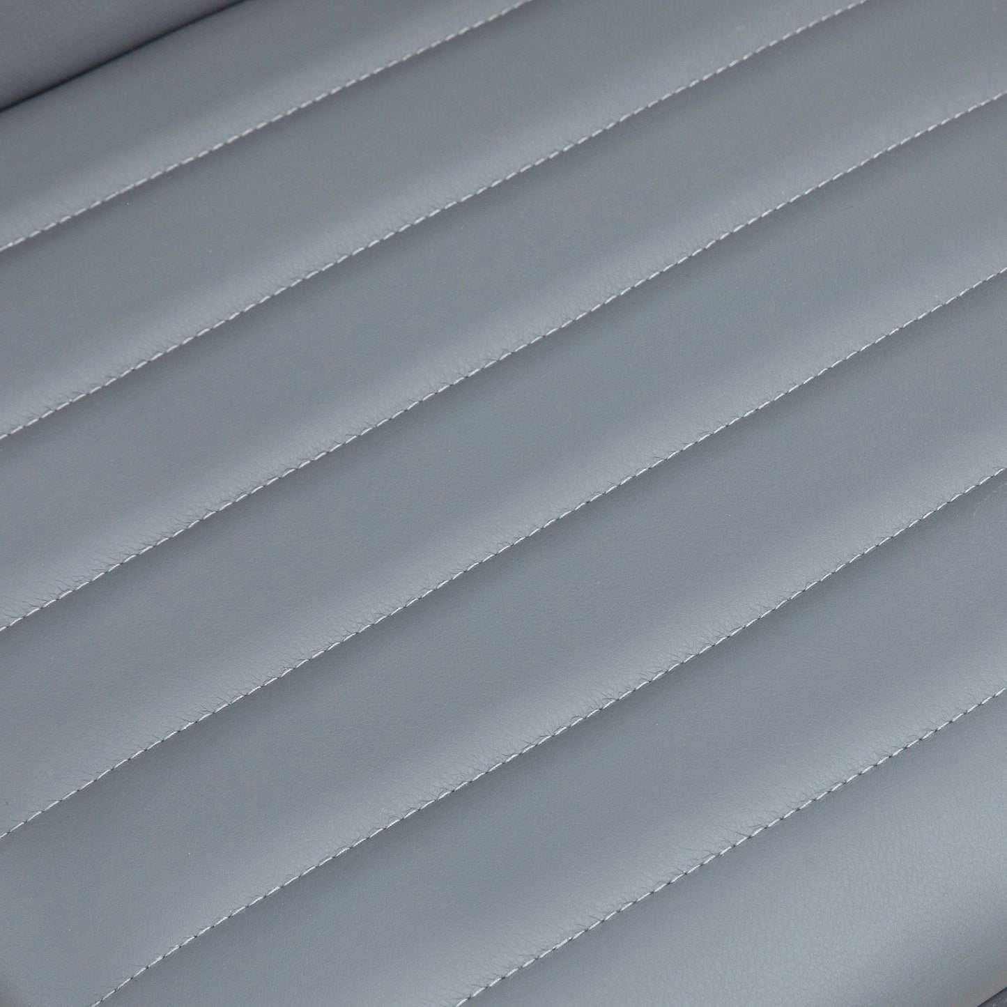 HOMCOM chair close-up of light gray faux leather upholstery and stitched channels