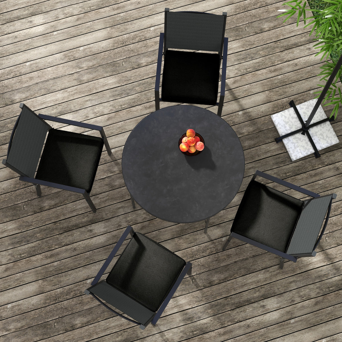 Outsunny black cushions fitted on four patio chairs around a table