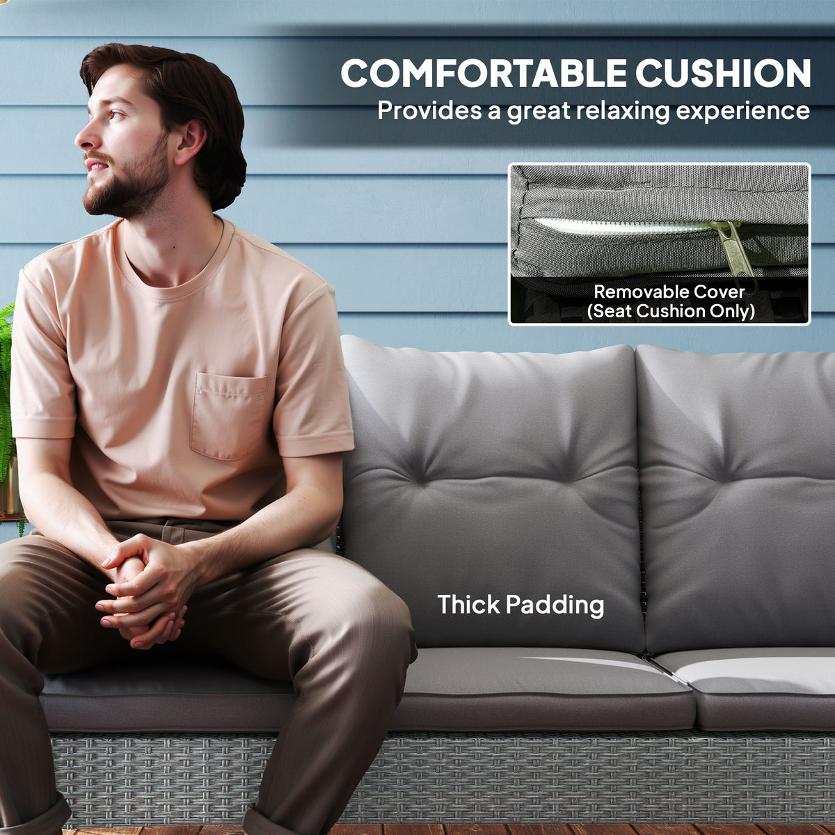 Grey patio sofa with thick tufted cushions and a removable seat cushion cover