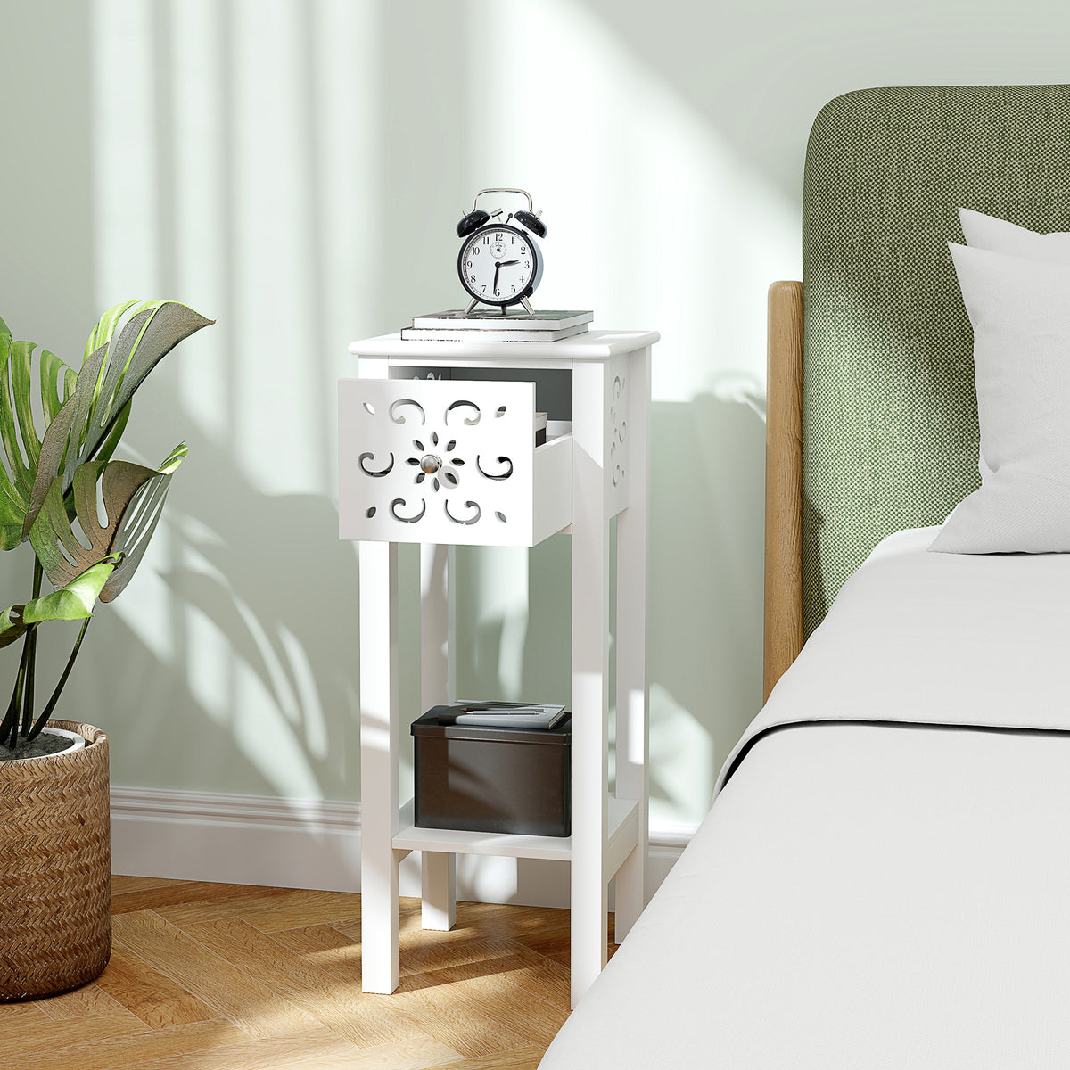 White floral cut-out bedside table with drawer and lower shelf