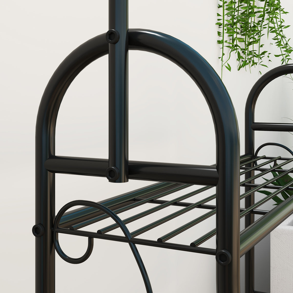 Outsunny plant stand close-up showing curved metal supports and a slatted shelf