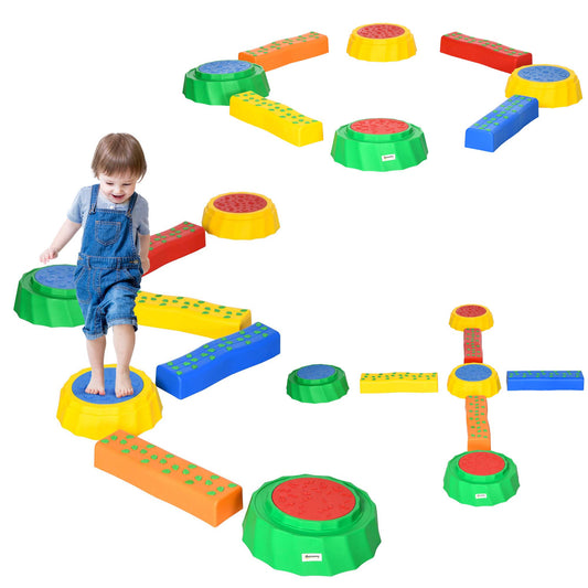 Multicolored kids' stepping stones and balance beams arranged as play paths, with a child stepping