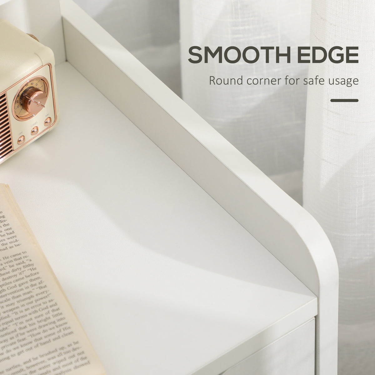 Close-up of the white nightstand's rounded corner and smooth tabletop edge