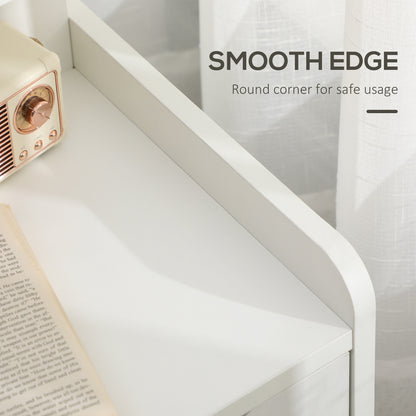 Close-up of the white nightstand's rounded corner and smooth tabletop edge
