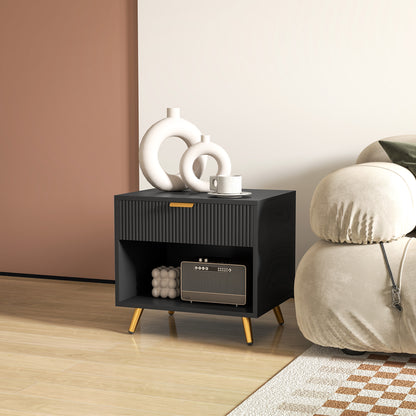 Black bedside table with fluted drawer front, open shelf, and gold-tone legs