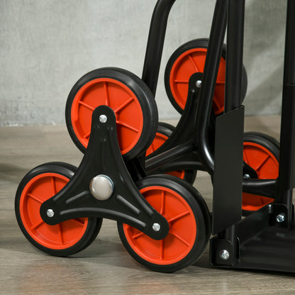 Close-up of the hand truck's red stair-climbing wheels and black wheel brackets