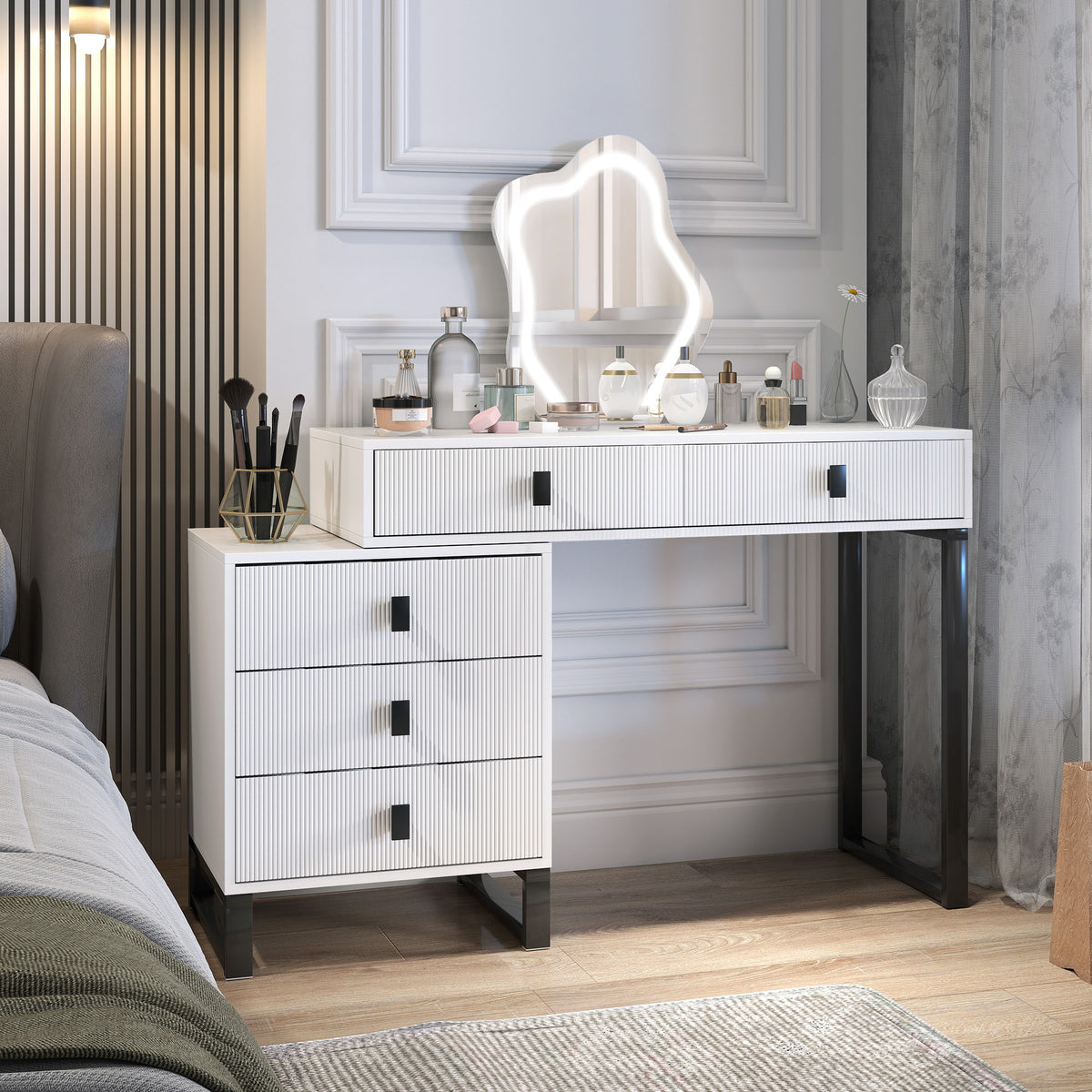 White five-drawer vanity desk with a glowing leaf-shaped mirror and black metal legs.