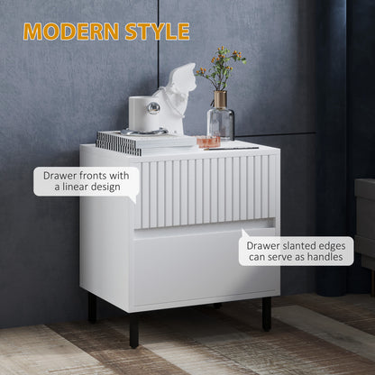 White two-drawer bedside table with vertical grooves and angled drawer edges