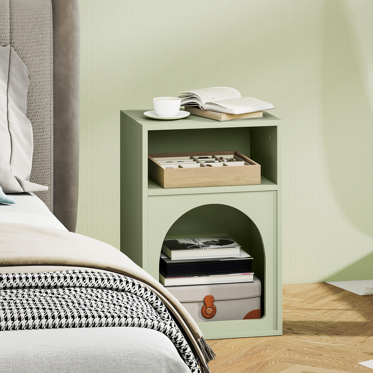 Light green bedside table with a tea tray in the upper compartment and a suitcase below