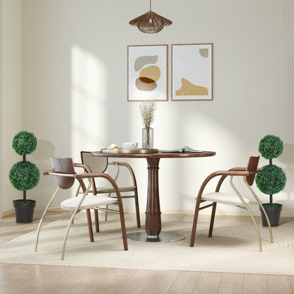Pair of Outsunny artificial boxwood topiaries in black pots, shown beside a dining table