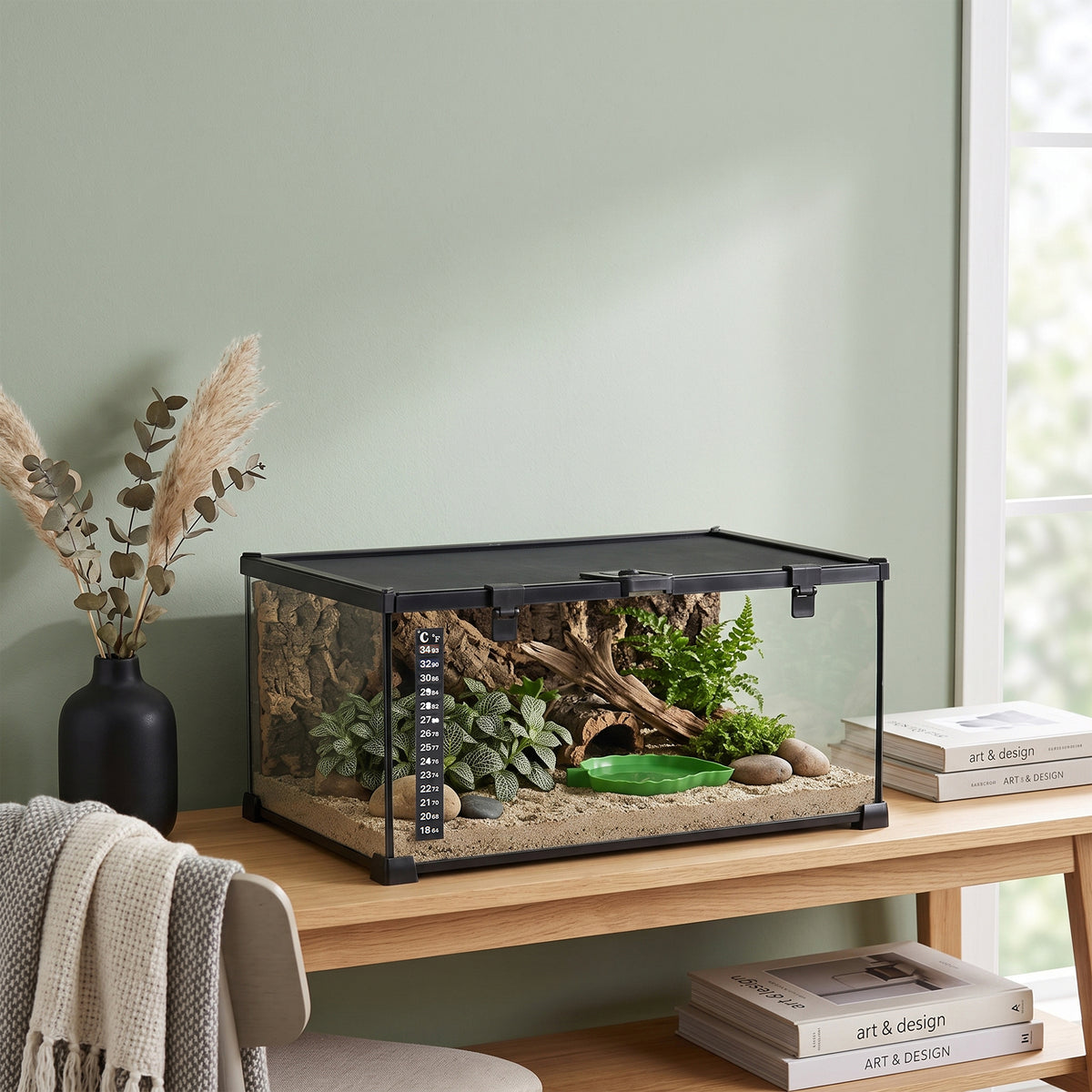 PawHut glass reptile terrarium with mesh lid, thermometer, plants, and rocks