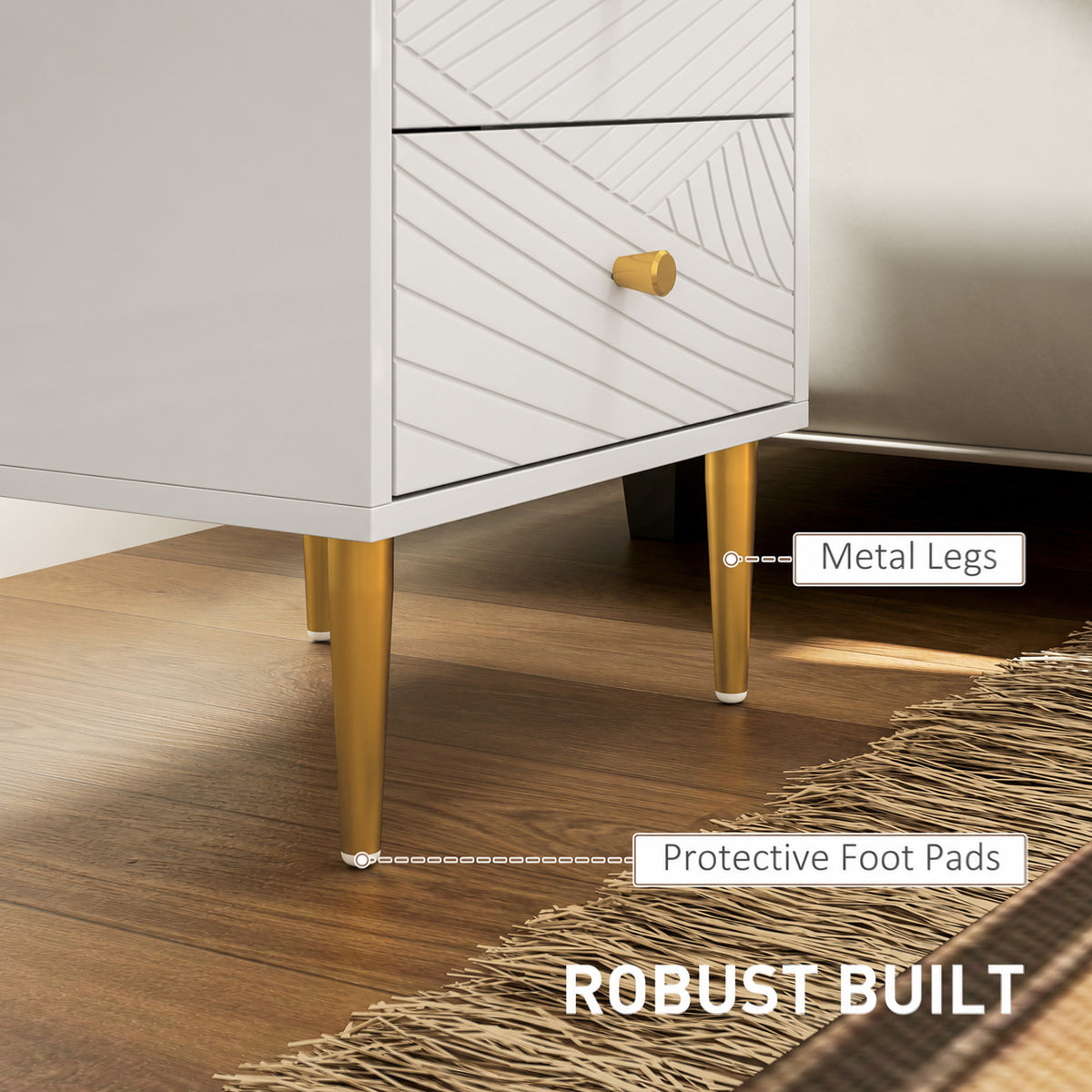 Bedside table detail showing tapered gold-tone metal legs and protective foot pads