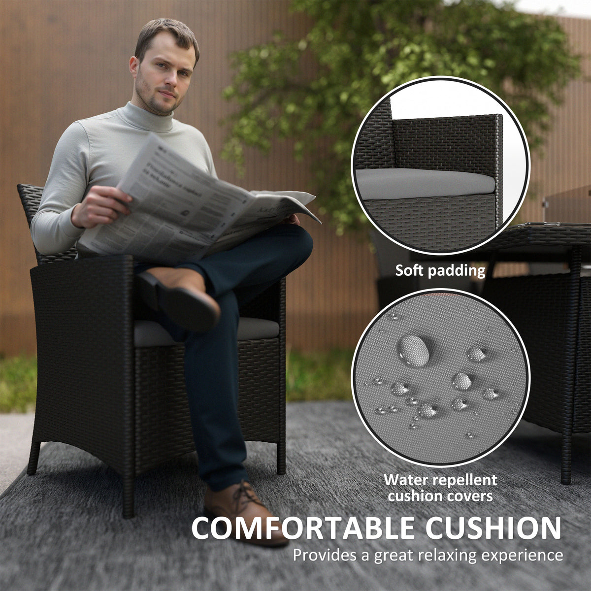 Black rattan armchair with a padded, water-repellent gray cushion