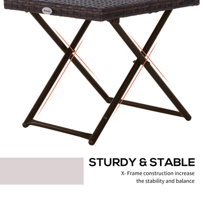 Brown folding side table with crossed X-frame legs for stability