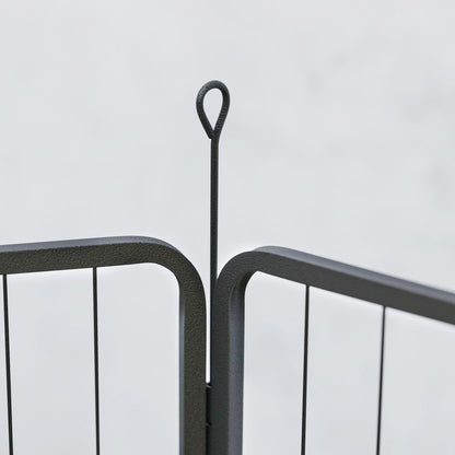 PawHut black dog playpen panel joint secured by a looped ground stake