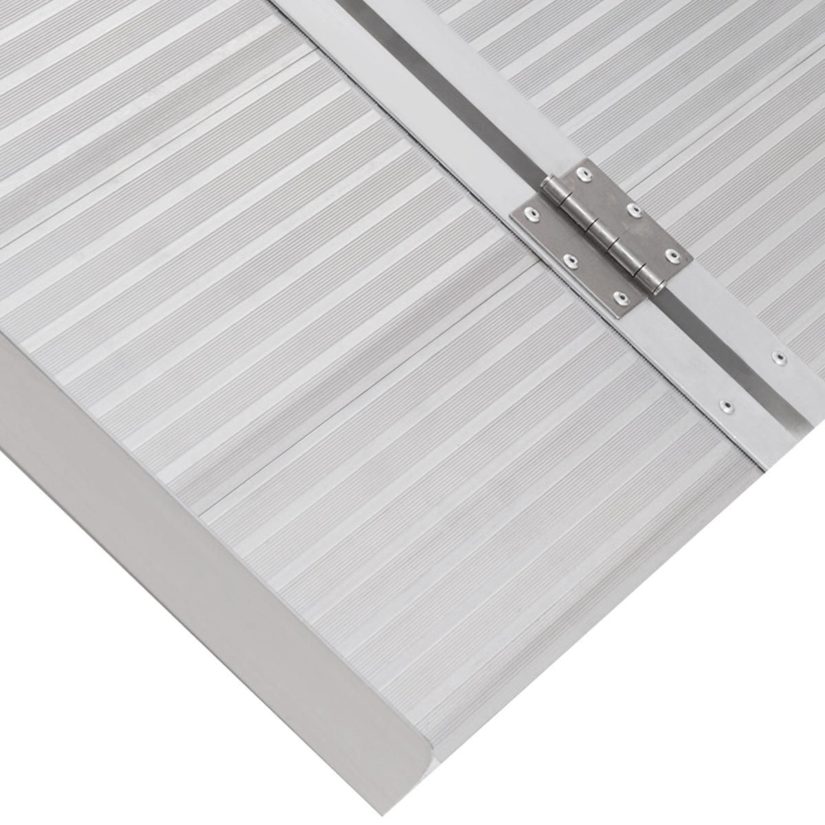 Close-up of the wheelchair ramp's ridged surface and center hinge