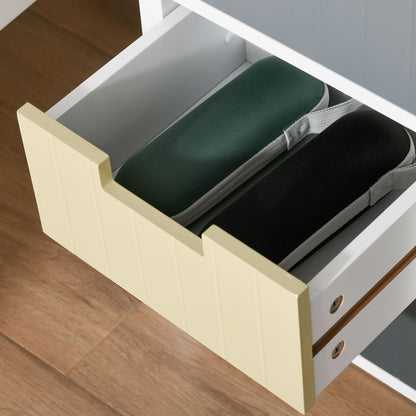 HOMCOM chest drawer in pale yellow holding shoes