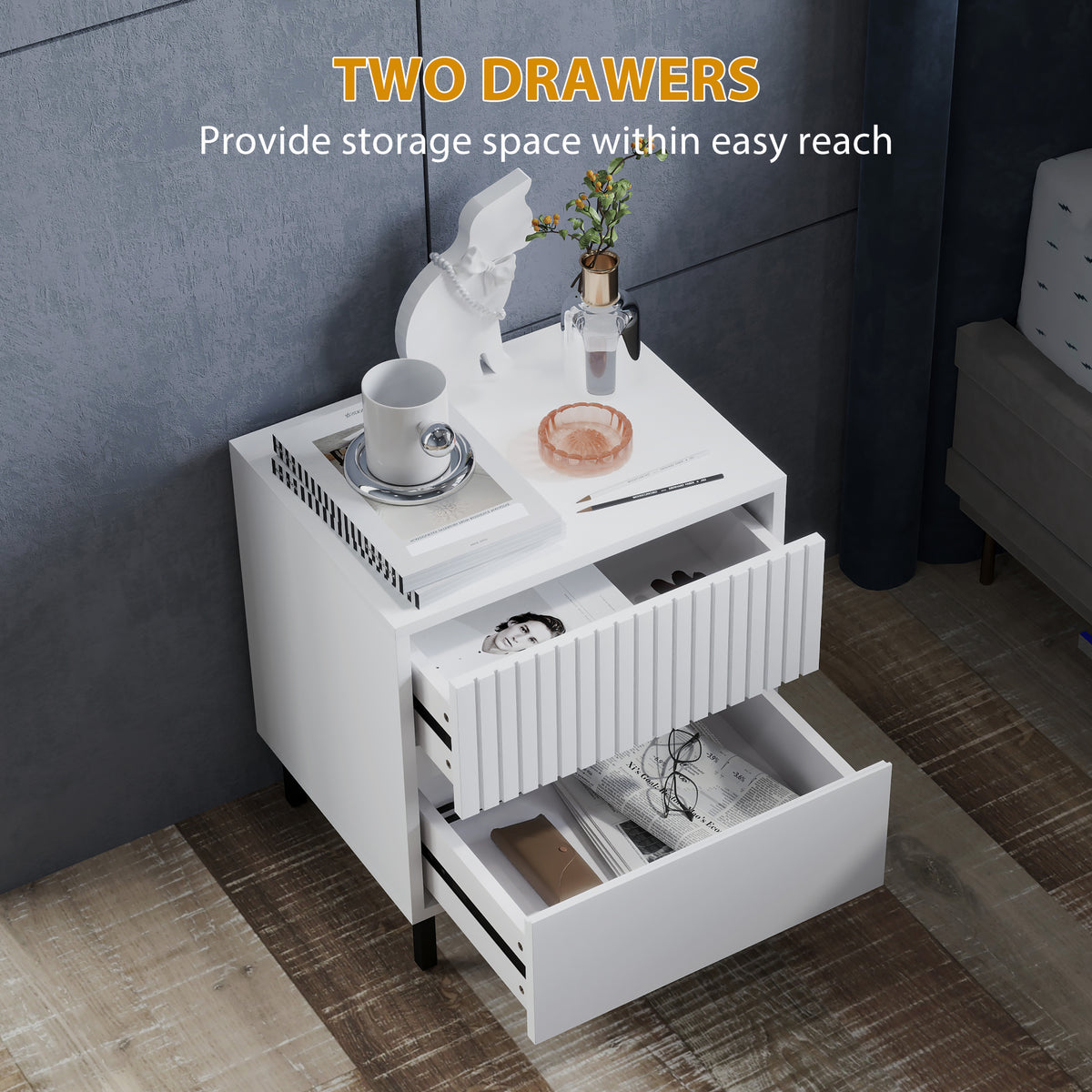 White bedside table with both drawers open, showing the storage space